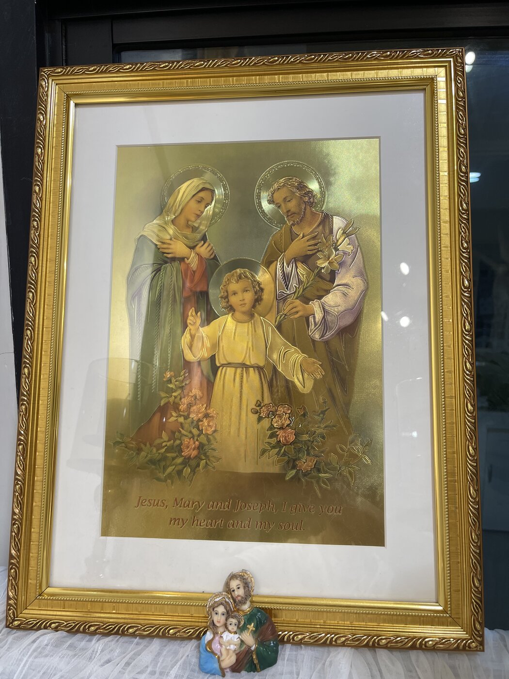 The Holy Family in a gold frame